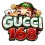 โลโก้ GUCCI168 บนพื้นโปร่งใส กลางภาพเป็นเทพเจ้าโชคลาภจีนหน้ากลมยิ้มตาหยี สวมหมวกทรงจีนสีเขียวมรกตคาดแถบแดง ประดับพลอยเขียวในกรอบทอง มีเหรียญทองจีนห้อยสองข้าง ด้านหน้าเป็นตัวอักษร GUCCI สีขาวเงินตัดขอบเขียวมรกต วางทับตัวเลข 168 สีแดงเมทัลลิกตัดขอบทอง
